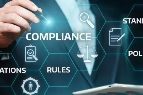 Business professional discussing compliance with regulations and standards using digital interface elements.