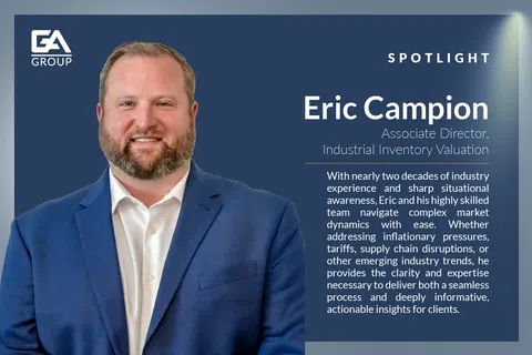 Professional portrait of Eric Campion, Associate Director of Industrial Inventory Valuation, with company branding.