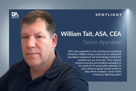 Portrait of William Tait, Senior Appraiser with expertise in printing and converting industries, against blue background.