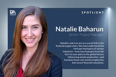 Portrait of Natalie Baharun, Senior Project Manager, with company spotlight text on financial supply chain roles.