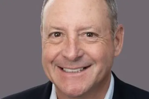 a man smiling for the camera