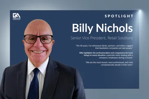 Portrait of Billy Nichols, Senior Vice President of Retail Solutions at GA Group, smiling in formal attire.