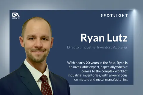 Professional portrait of Ryan Lutz, Director of Industrial Inventory Appraisal at GA Group, wearing a suit and tie.