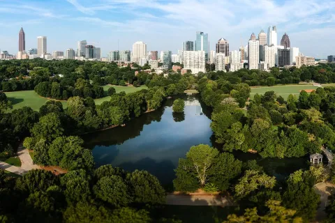 a city skyline with a river