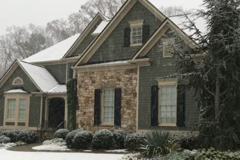 a house covered in snow
