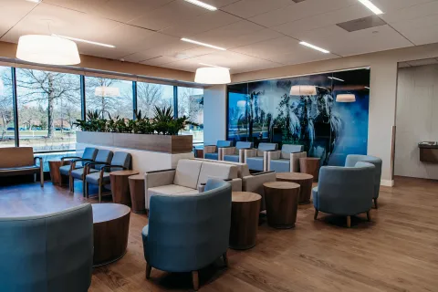 a room with chairs and tables