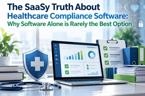 Healthcare compliance software concept with laptop, medical shield, stethoscope, and office documents on desk.
