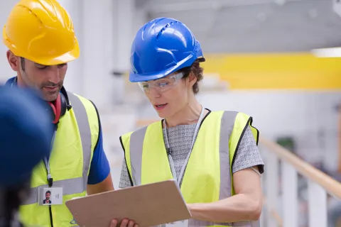 a few men wearing hardhats