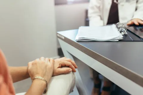a person holding a piece of paper