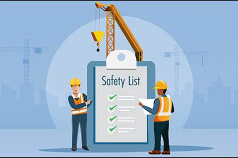 Construction workers in safety vests reviewing a safety checklist with cranes and cityscape in background