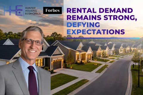 Smiling man in suit with suburban homes background and text about strong rental demand defying expectations.