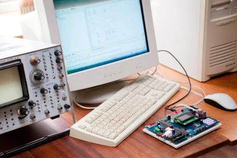 an old computer and keyboard