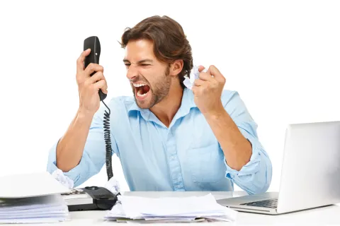 a man angry on the phone