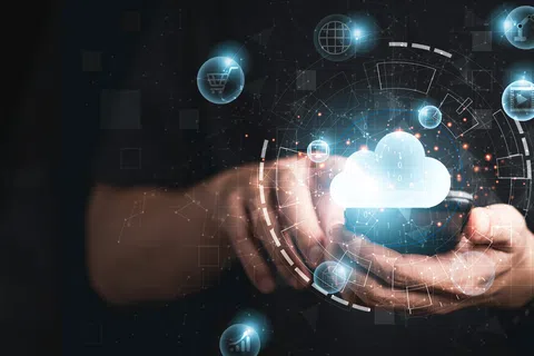 Hands holding smartphone with glowing cloud computing and digital data icons hologram interface