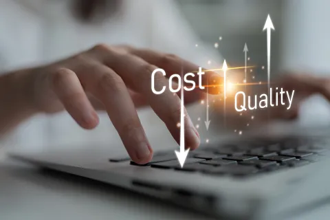 Hand typing on laptop keyboard with digital arrows showing cost decreasing and quality increasing concepts.