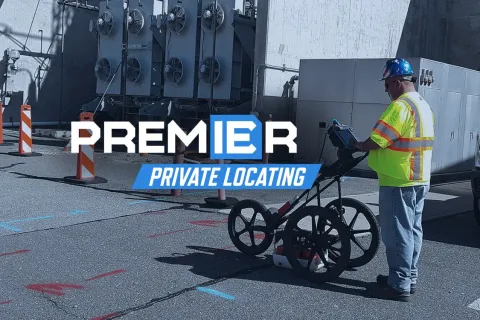 a man with a bicycle in front of a building
