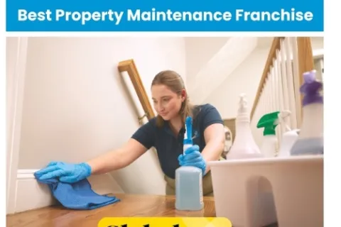 Woman cleaning wooden floor near stairs with cleaning supplies, promoting top property maintenance franchise award.