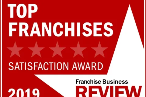 Top Franchises Satisfaction Award 2019 badge by Franchise Business Review with five stars on red background