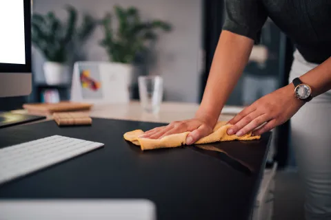 a person holding a cloth