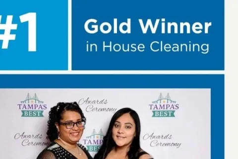 Two women smiling at Tampa's Best Awards Ceremony for #1 Gold Winner in House Cleaning