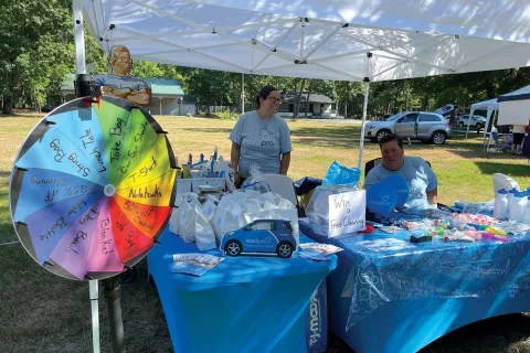 MaidPro community event tables featuring giveaways and raffle