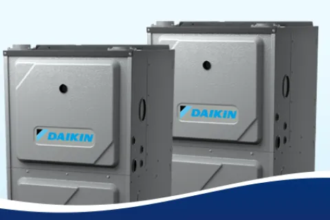 Two Daikin HVAC units with a sleek design against a light blue background.