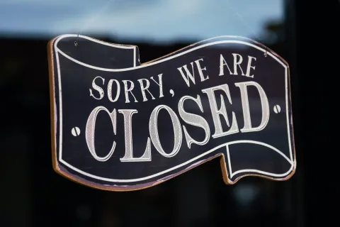 a sign with writing on it