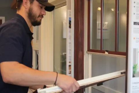 How to put a window sash back in place