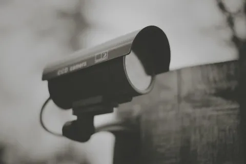 a black and white photo of a camera