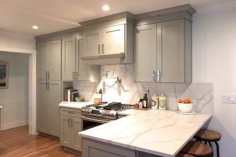 a modern kitchen with stainless steel appliances