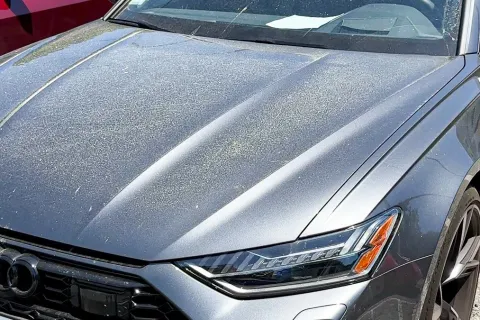 a shiny silver car