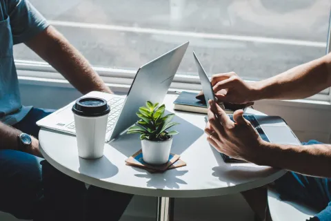 people working on a laptop