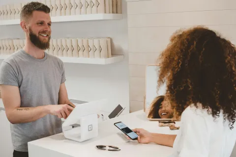 a business owner successful reputation marketing happy customer