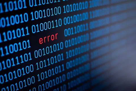 Blue binary code and red error text on dark background symbolizing a digital error or coding problem.