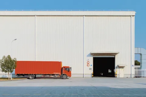 a truck parked outside a building