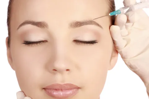 a close up of a person brushing the teeth