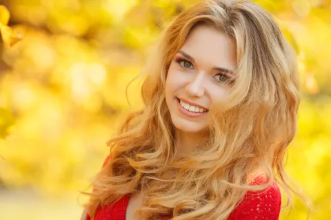 a woman smiling for the camera