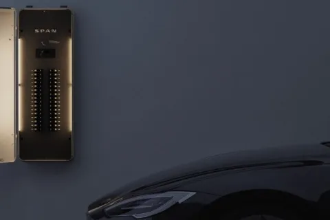 a car parked next to a box