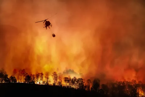 a helicopter flying in the air