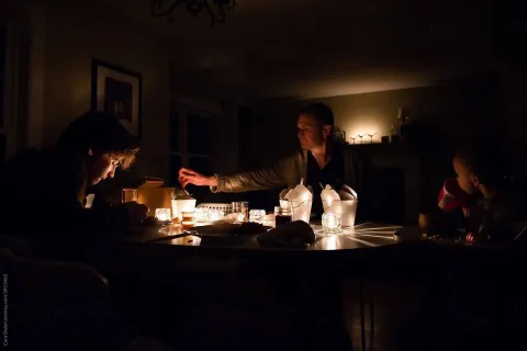 a group of people sitting at a table