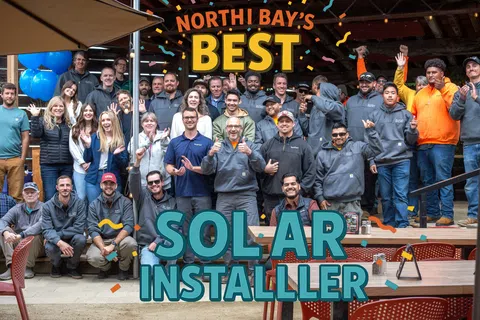 Group photo of North Bay's best solar installers posing outdoors with celebratory text and decorations.