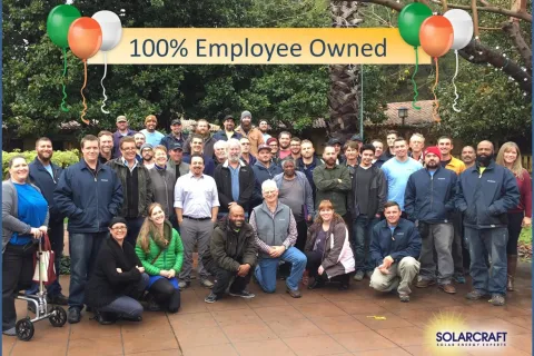 a group of people posing for a photo