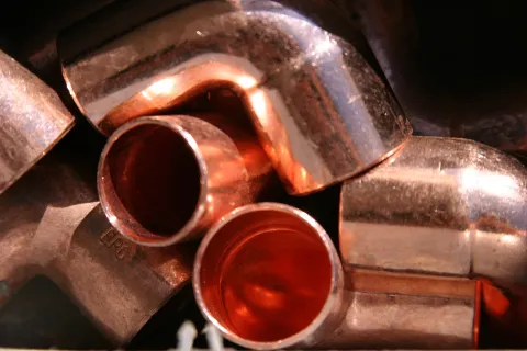 a close up of a metal plumbing pipes