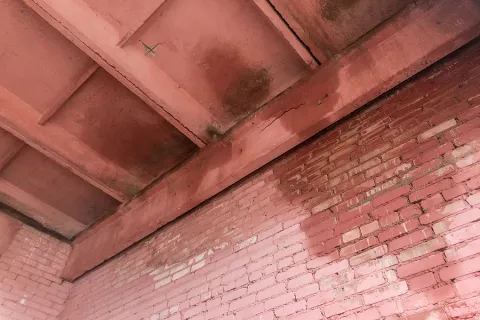 a brick wall with a hole in it