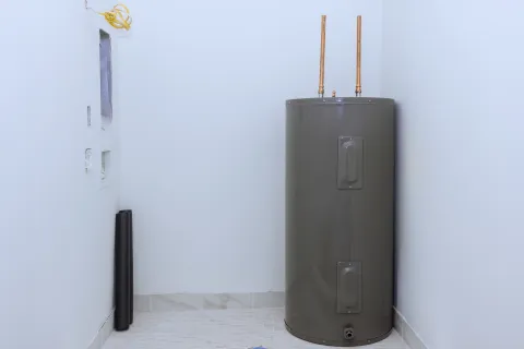 a metal cylinder in a room