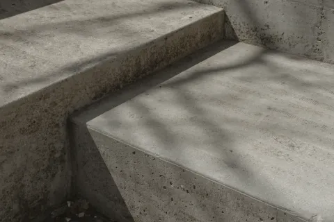 a concrete wall with a hole in it