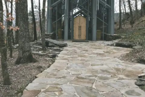 a stone path leading to a building