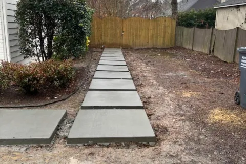 a small garden in a backyard