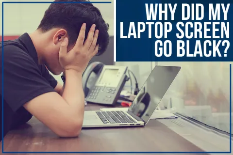 a person with the head in the hands looking at a laptop