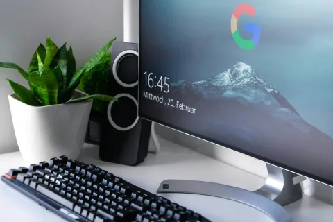 a computer monitor and keyboard